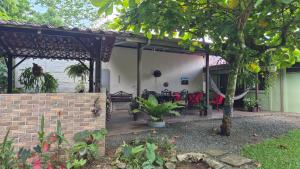 a patio of a house with a brick wall at Arboleda House by the River, Forest with Jacuzzi and A C in San Francisco