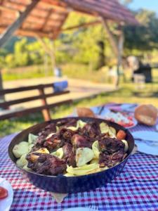 a bowl of food sitting on a table at Pridvorica in Gacko +17 photos