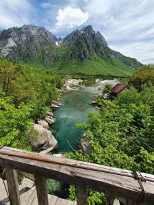a view of a river with mountains in the background at Guest House Avdi Kola in Gagu