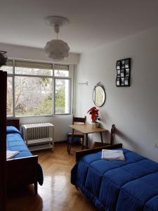 Postel nebo postele na pokoji v ubytování Hostal Costa Azul