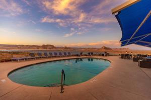 a swimming pool with a view of the desert at Lake Powell Resort in Page