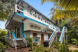 a building with stairs leading up to it at Condo #24 @ Beachside Villas in Placencia