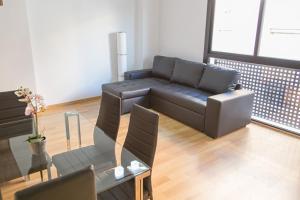 Posedenie v ubytovaní Apartamento Eursu centro con piscina
