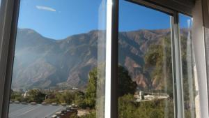 a window with a view of a mountain at Casa Las Pencas in Maimará