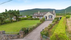 a home in the hills with a driveway at 4 Bed in Inch oc-ii11636 in Caheracruttera