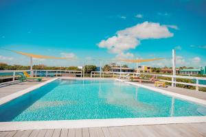 a swimming pool on the roof of a building at Villa 12 at Mara Laguna - Gold Standard Certified in San Pedro