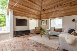 a living room with a couch and a tv at 3 Bed in Ditchingham oc-s42751 in Ditchingham
