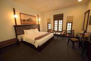 Rúm í herbergi á Hotel Nippon Colombo