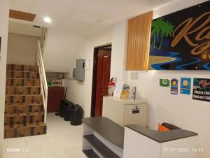 a room with a staircase and a stair case at Raje Residence El Nido in El Nido