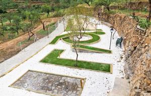an overhead view of a park with trees and grass at Jaraiz in Laroya +9 photos