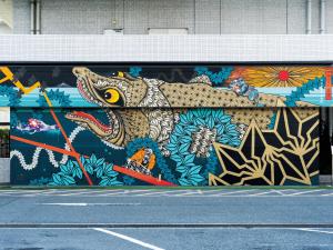 a wall with a painting of a dragon on it at Hotel Plaza Osaka in Osaka