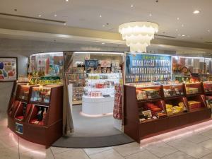 a store filled with lots of products in a store at Hotel Plaza Osaka in Osaka +40 photos