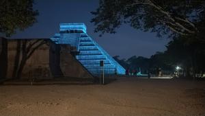 a blue staircase in a park at night at Casa mahana in Pisté +11 photos