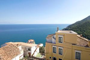 a view of the ocean from a building at Starhost - CASA BETTINA enchanting seaview in Vietri sul Mare