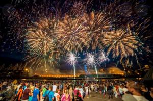 a crowd of people watching a fireworks show at Vadim Home 2 in Ventspils