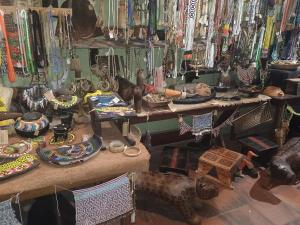 a store filled with lots of different items on display at Bela Vista Pousada Alter in Alter do Chao +13 photos