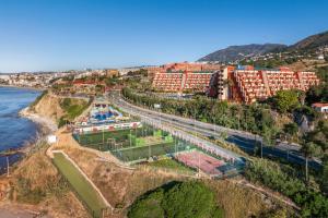 an aerial view of a city next to the ocean at Holiday World Resort, Affiliated by Melia in Benalmádena