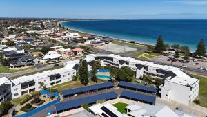 an aerial view of a building next to the beach at Sound Views Apartment in Safety Bay