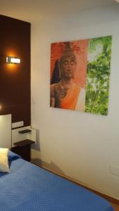 A bed or beds in a room at Residential Majada Apartments