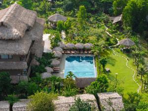 an aerial view of a resort with a swimming pool at Tam Coc Oasis Resort & Spa in Ninh Binh