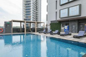 a swimming pool on the roof of a building at Newly Renovated - Days Inn by Wyndham Singapore Novena in Singapore