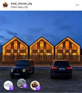 two cars parked in front of a house at Esal house in Chon-Sary-Oy