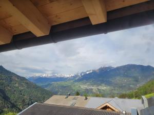 a view of mountains from the roof of a house at Panoramablick Kaunergrat Homes in Kaunerberg