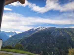 a view of the mountains from a house at Panoramablick Kaunergrat Homes in Kaunerberg
