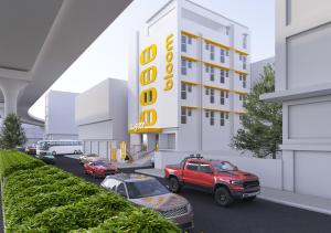 a rendering of a parking lot in front of a hotel at Bloom Hotel CMH Road Indiranagar in Bangalore