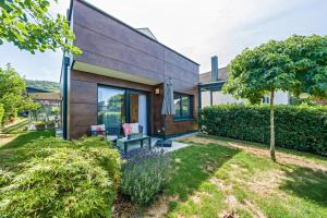a house with a garden in front of it at Apartment Nest 20 in Ettenheim