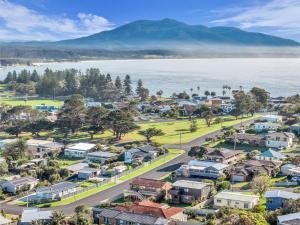 an aerial view of a small town next to the water at Callow Place 10 in Bermagui