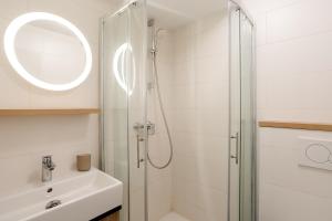 a bathroom with a shower and a sink at Casa Riccobon 5 in Koper