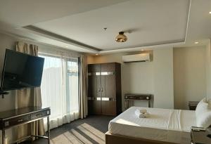 Televisyen dan/atau pusat hiburan di The Fields Palace Hotel Premier