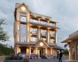 a large building with people walking in front of it at Dalabiang Hotel in Da Lat