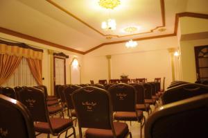 a conference room with chairs and a table in it at San Marino Royal Hotel in Sucre