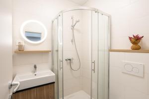a bathroom with a shower and a sink at Casa Riccobon in Koper