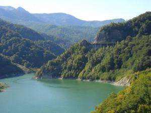 a view of a river in the mountains at MaraStudio in Caşoca +8 photos