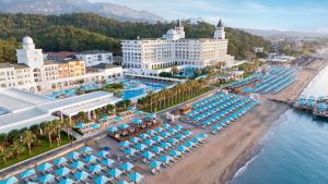 an aerial view of a resort with a beach and swimming pools at Nirvana Dolce Vita - Ultra All Inclusive in Tekirova
