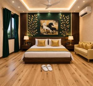 a bedroom with a bed and a painting of a horse at Hotel La Casa Near Delhi Airport in New Delhi