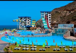 a large water park with a water slide at Residence Jade in Bir el Djir