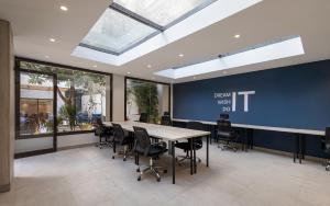 a conference room with a table and chairs at Exclusive stay with luxury touches at 22 by spacey #55 Studio in Maadi in Cairo +14 photos