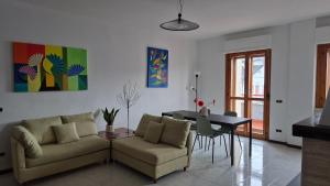 a living room with a couch and a table at Attico 14 in Castel di Sangro