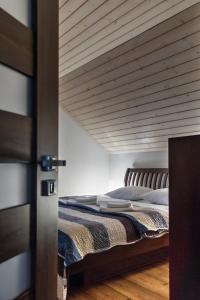 Postel nebo postele na pokoji v ubytování Holiday House Sabala 1