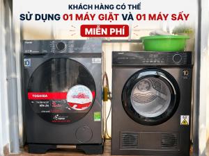 a washer and a dryer sitting next to each other at Solwind Riverside in Danang