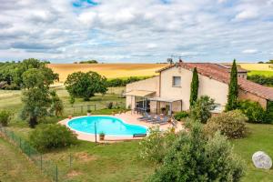 an image of a house with a swimming pool in front of it at Les Hauts de Grazac, Chambres et Tables d'hôtes in Grazac +38 photos