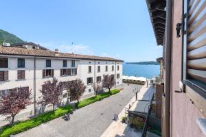 a view of the water from a building at Casa Regina Salò in Salò