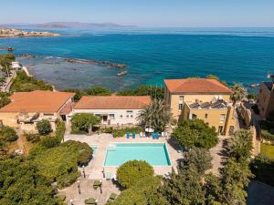 an aerial view of a house with a swimming pool at Villa Andromeda in Chania