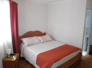 Postel nebo postele na pokoji v ubytování Hostal Alto Algarrobal