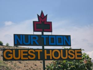 a sign for a nir town guest house at NUR TOON in Areni +34 photos