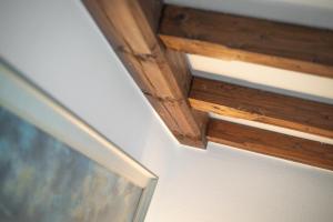 a close up of a wooden ceiling in a room at Sharky Bay in Keitum